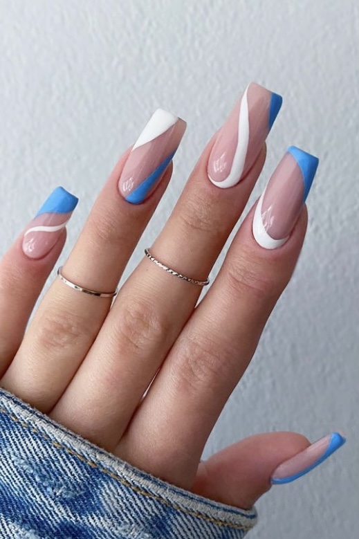 Blue and white nails, blue and white asymmetrical swirls