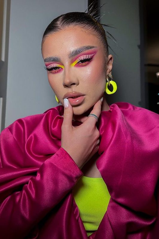 Neon pink and yellow cut crease eyeshadow look, date makeup